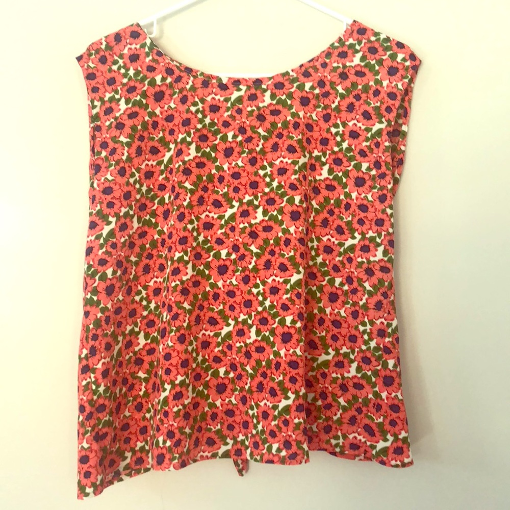 Flower crop top with open back.